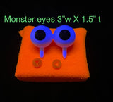 Blacklight monster puppet eyes