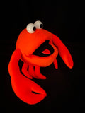 Blacklight orange crab puppet