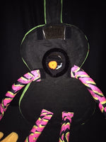 back side of walk about guitar puppet
